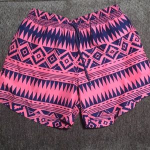 Pink and navy chubbies swim trunks